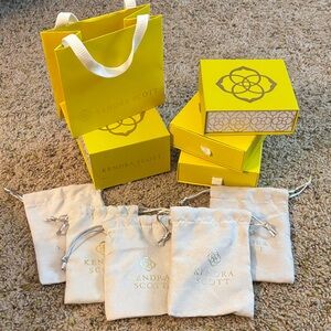 Kendra Scott Yellow Boxes and Cream Pouches Set